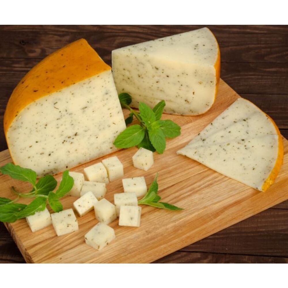 Semi-hard cheese Gouda Italian herbs Lelyakivsky 20002-lel photo