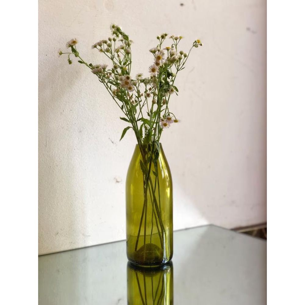A stylish glass vase with a bottle of wine Lay Bottle 17273-lay-bottle photo