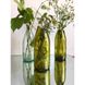 A stylish glass vase with a bottle of wine Lay Bottle 17273-lay-bottle photo 1