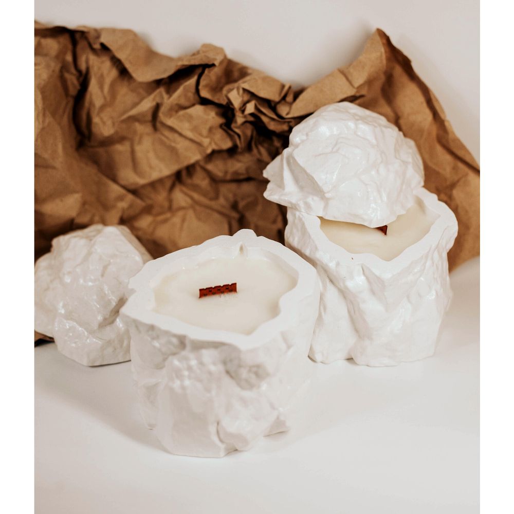 An interior candle in a plaster pot in the form of a stone PRO.ECO 17453-proeco photo