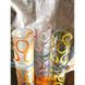 Clear vase with colorful bubbles from a used and salvaged glass bottle 17250-lay-bottle photo 2