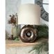 Ceramic table lamp on a brown shaped base in the shape of a bagel and a fabric lampshade 11887-yekeramika photo 1
