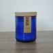 Candle from used and salvaged glass bottle, size L 10066-l-blue-none-uzsklo photo 1