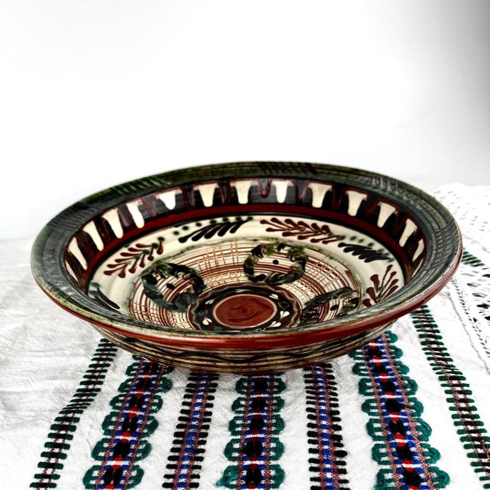 Ceramic platter/bowl with Bubnivka-style painting featuring a flowering branch design Ceramics of Podillia 24184-keram-pod photo